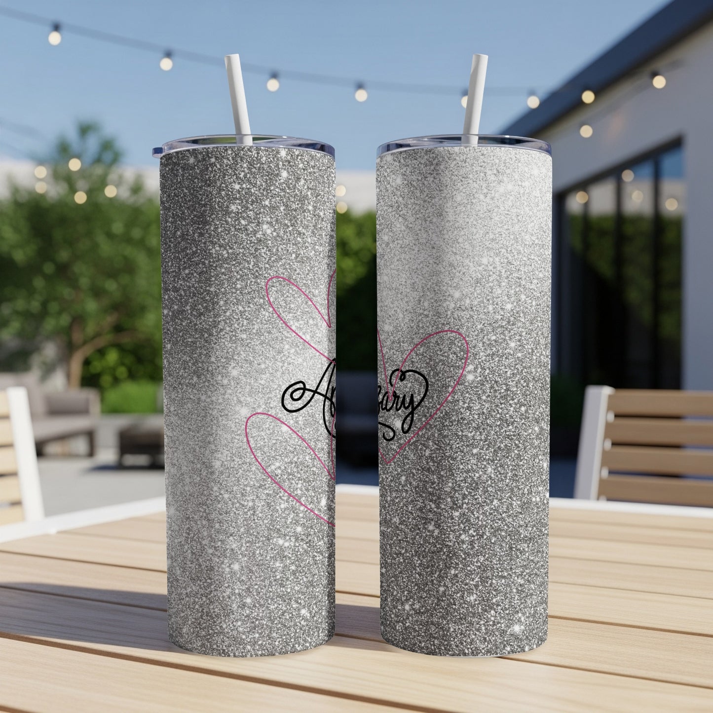 Silver glitter tumbler with "Anniversary" text and pink heart.