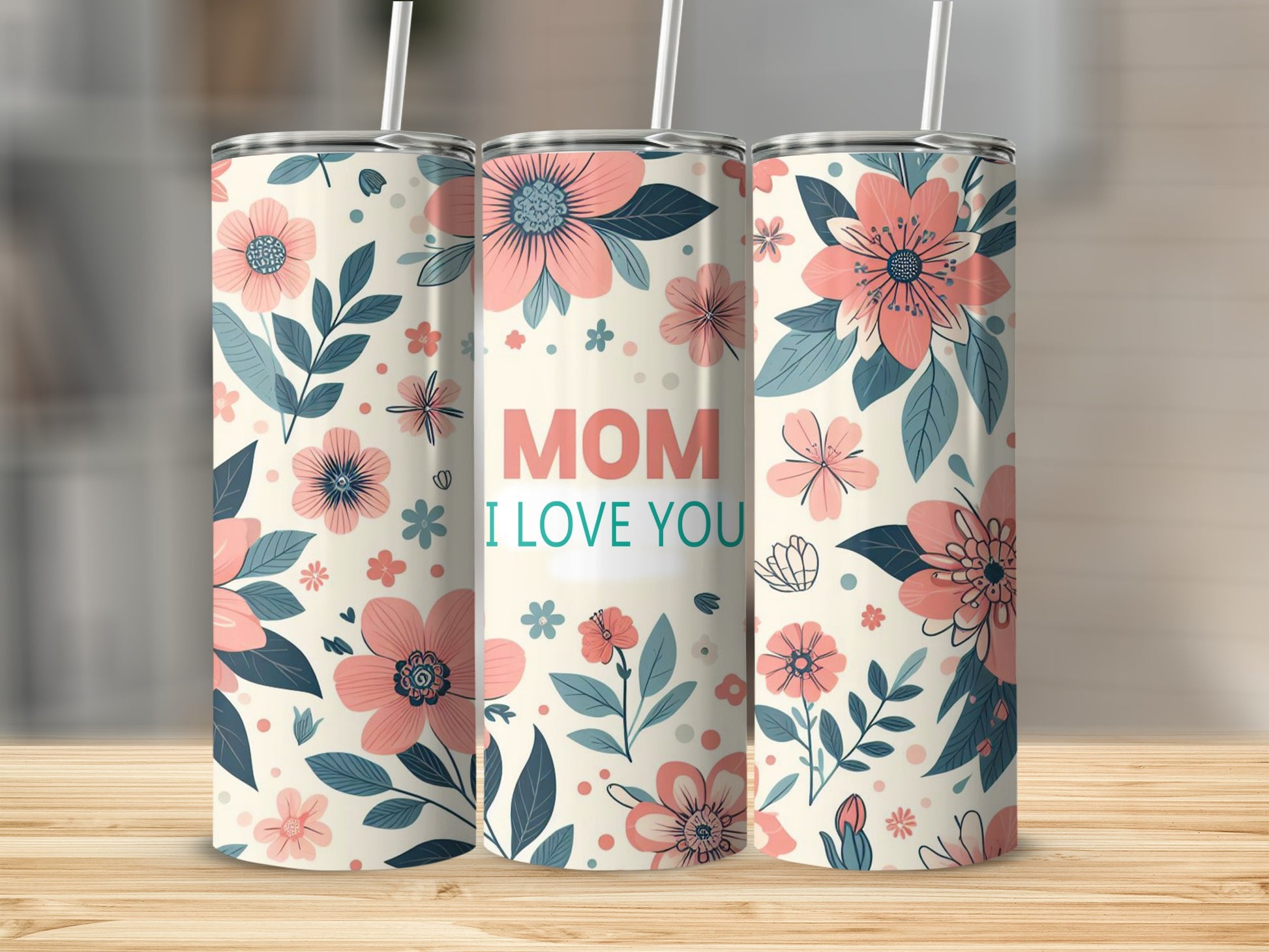 Floral tumbler with "MOM I LOVE YOU" text.