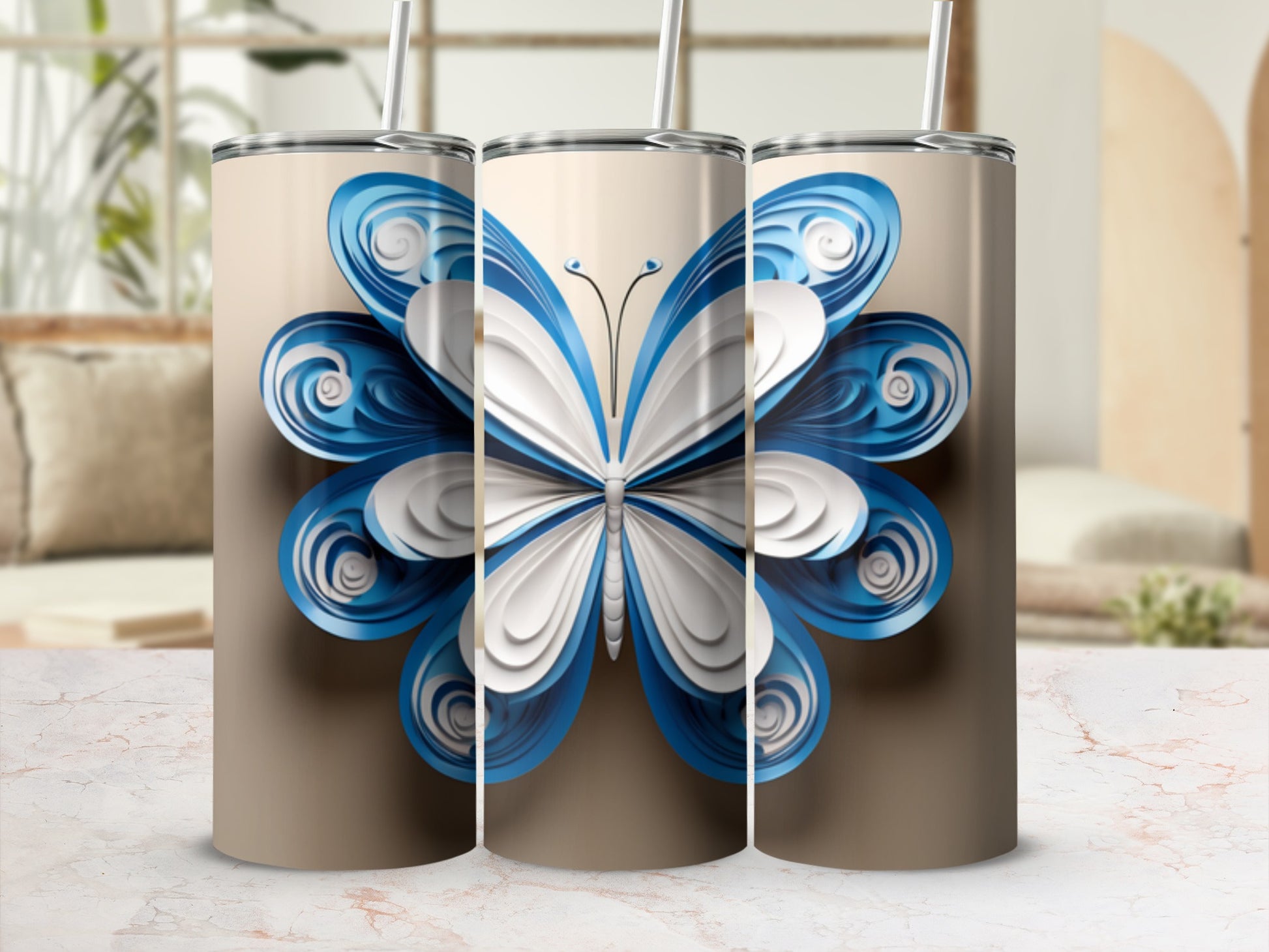 Three tumblers featuring a layered blue and white butterfly design.