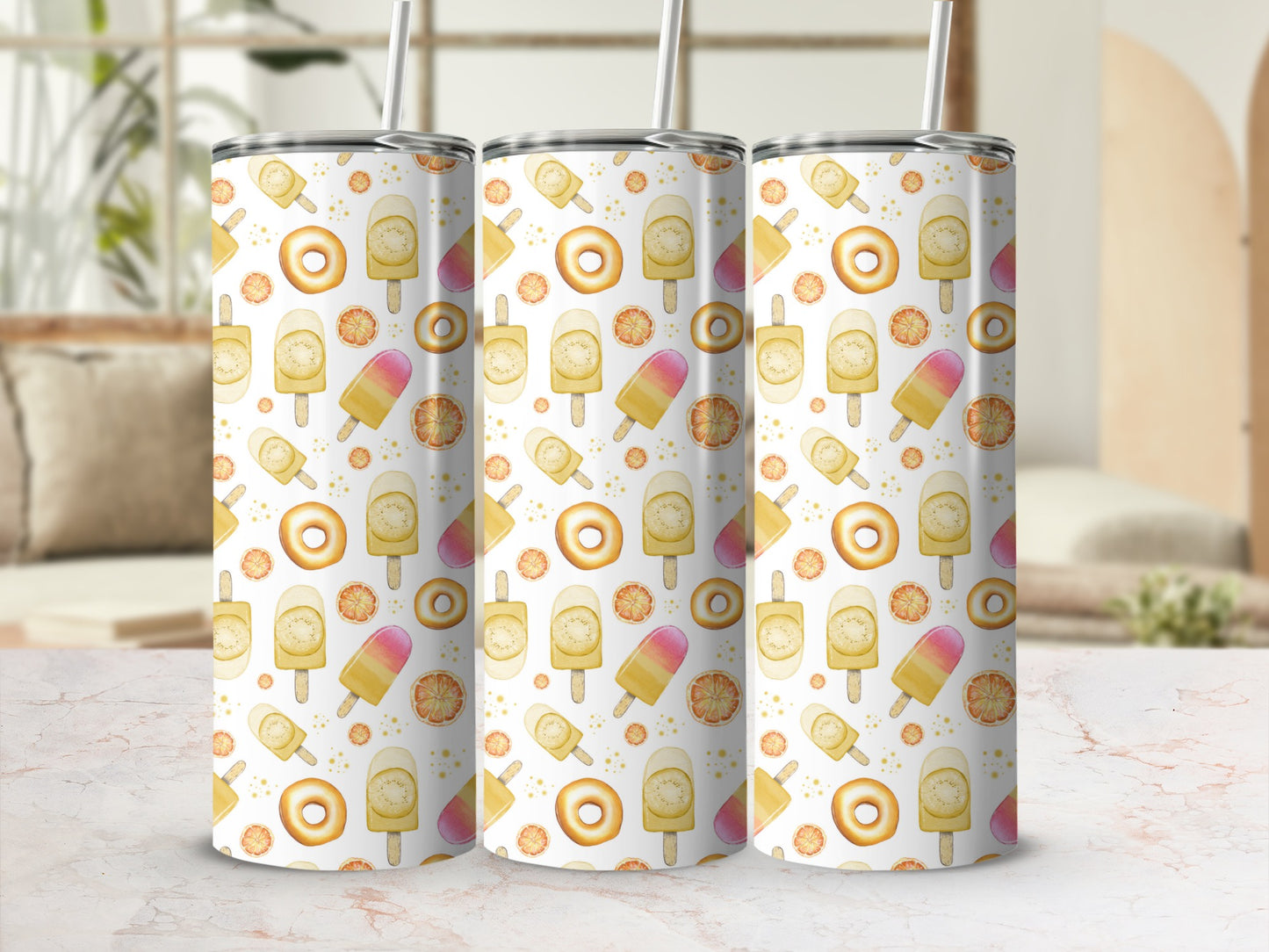 Three tumblers with a pattern of popsicles and citrus slices.