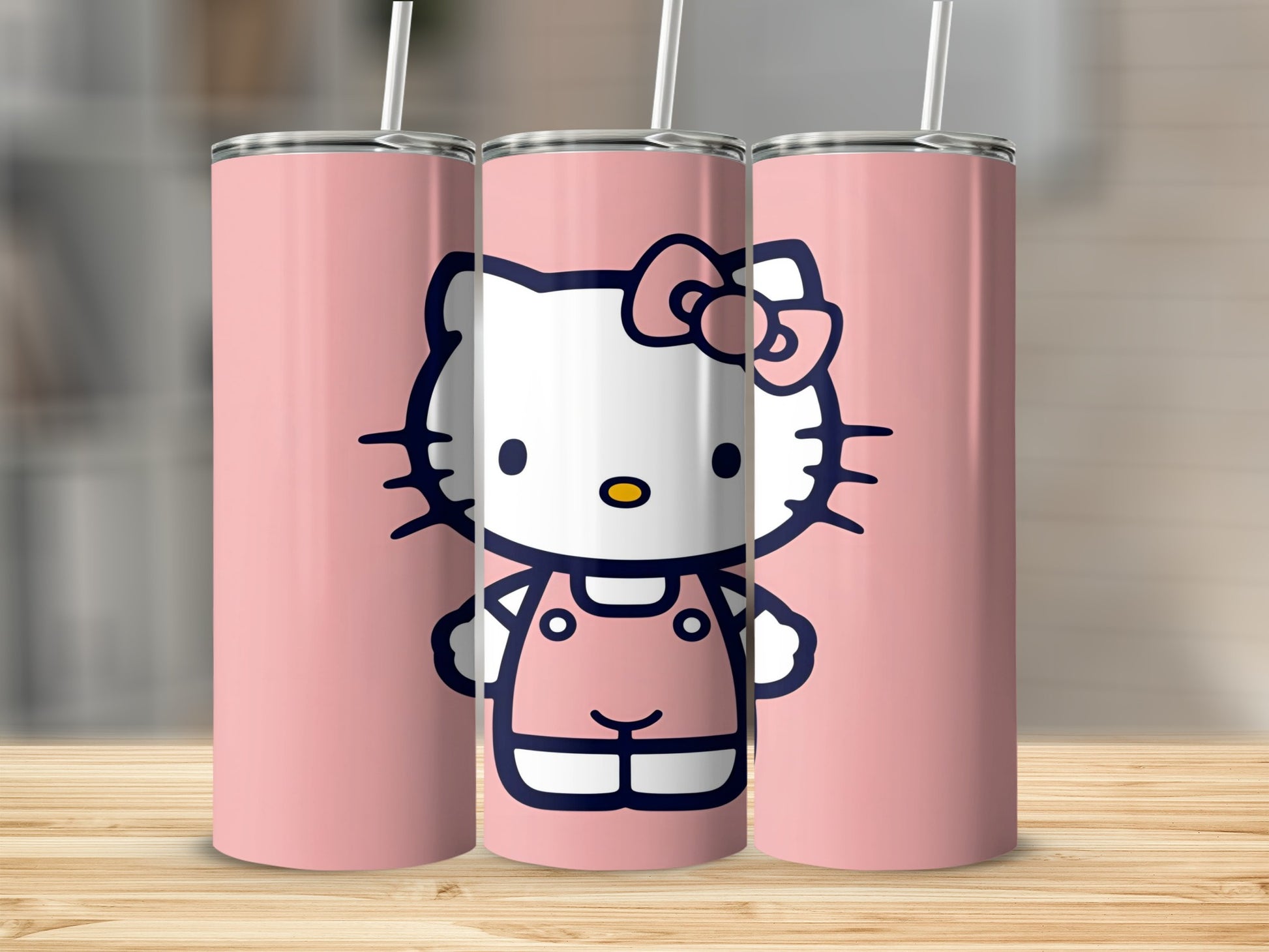 Hello Kitty in pink overalls on a pink tumbler.