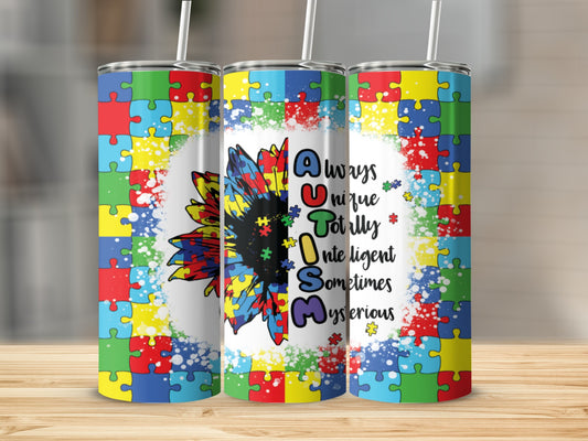 Autism awareness sunflower design on a tumbler, with colorful puzzle pieces.