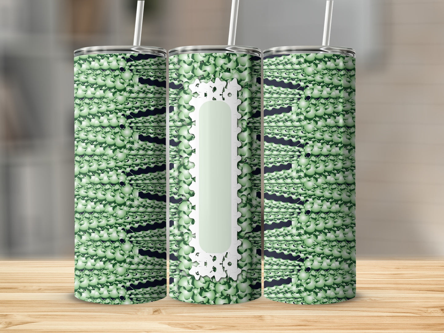 Green textured tumbler with white central panel and straw.