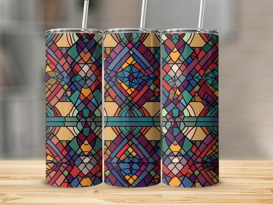 Three tumblers with stained glass pattern on wooden surface.