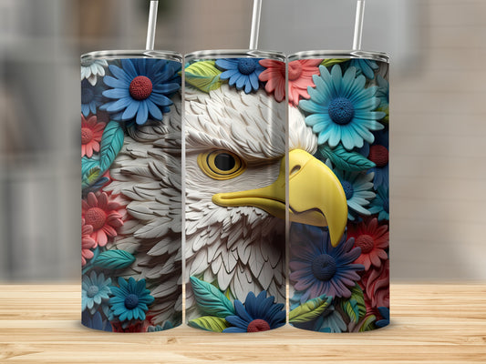 Three tumblers featuring a detailed eagle face surrounded by colorful flowers.