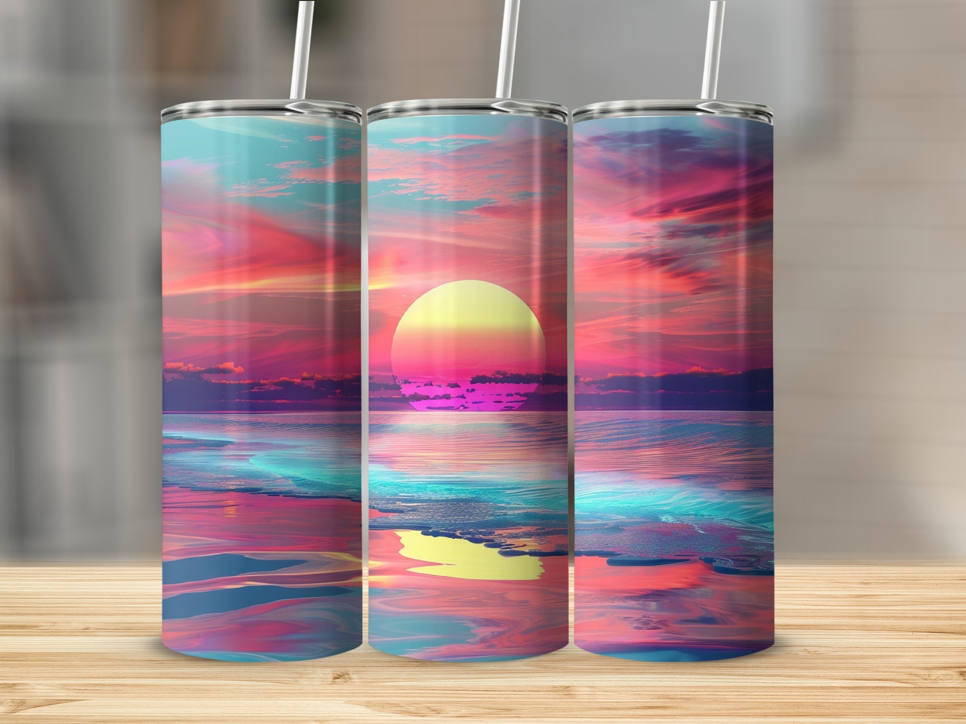Three tumblers displaying a vibrant sunset over a colorful ocean.