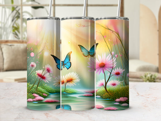 Three tumblers with butterflies and flowers on water.