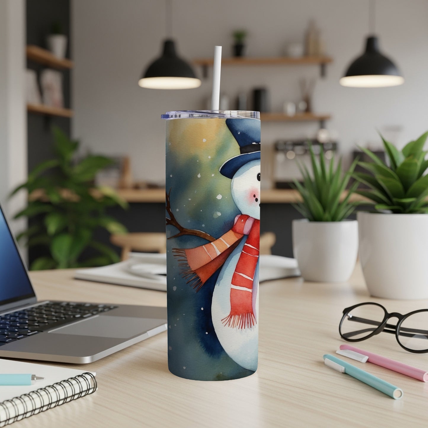 Watercolor snowman with scarf and hat on a tumbler with a straw.