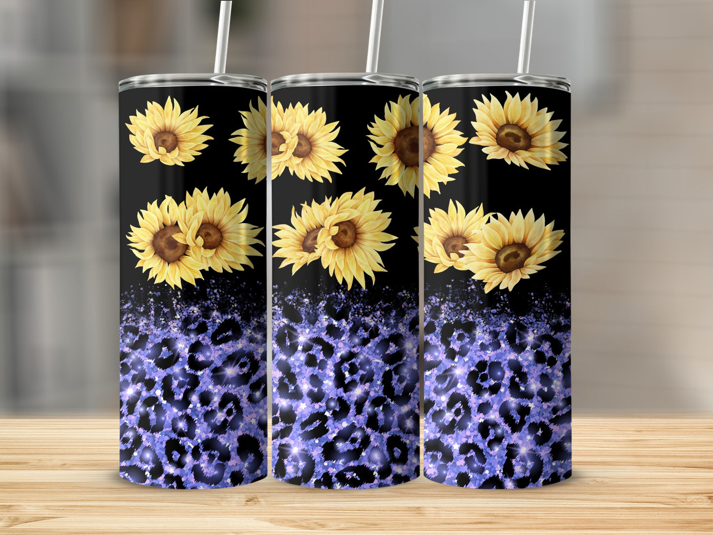 Three tumblers with sunflowers and purple leopard print.