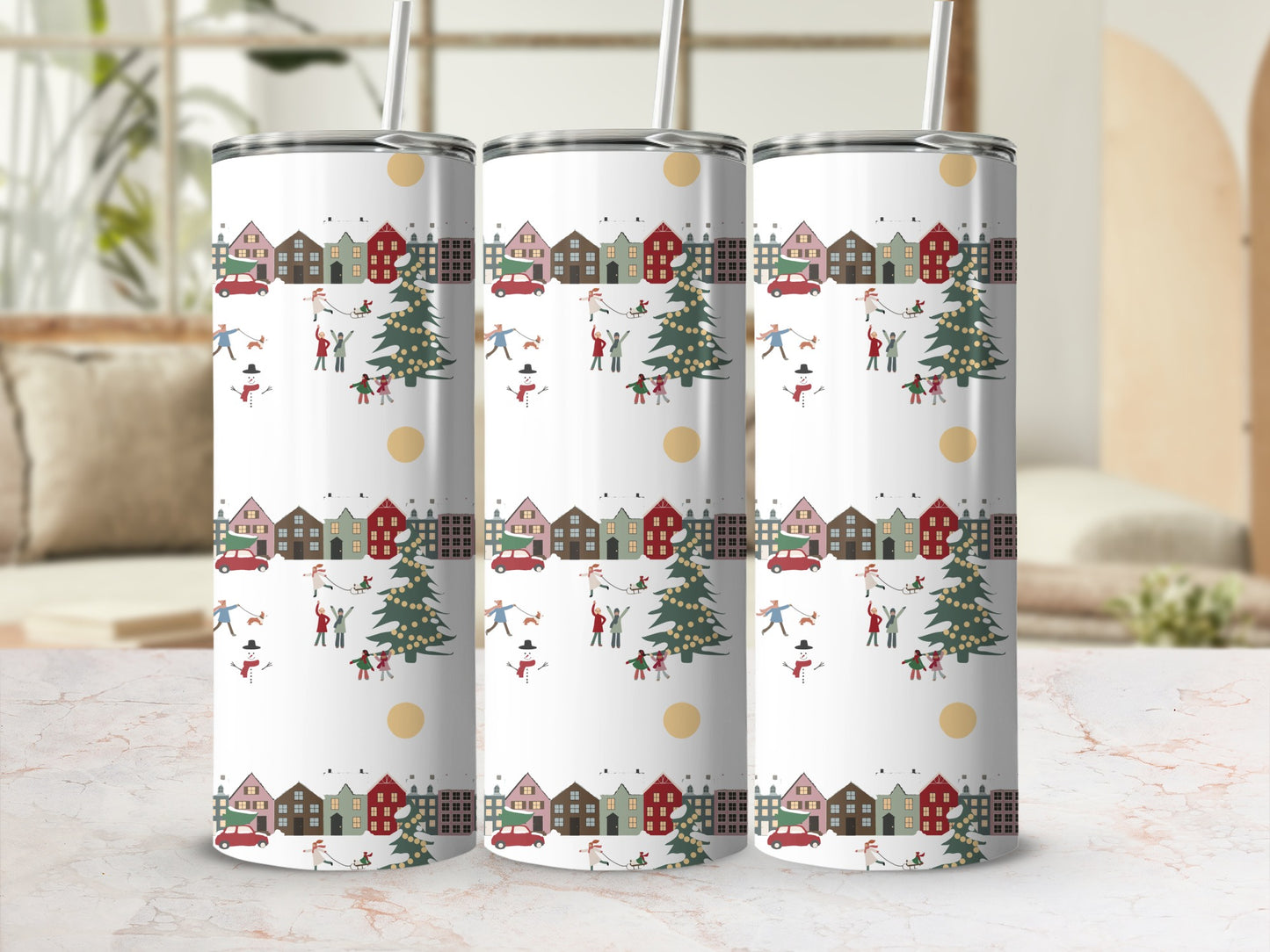 Three tumblers with a Christmas village, trees, and people pattern.