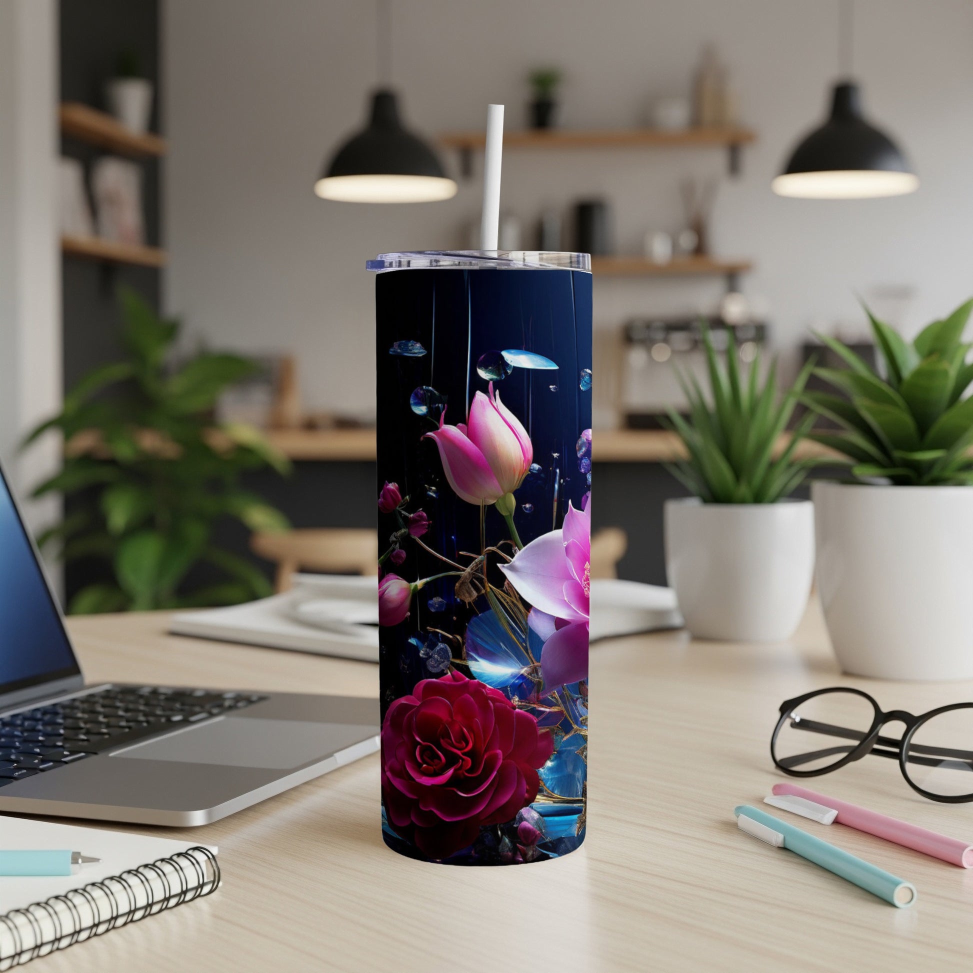 Floral design on a dark background with blue accents and a straw.