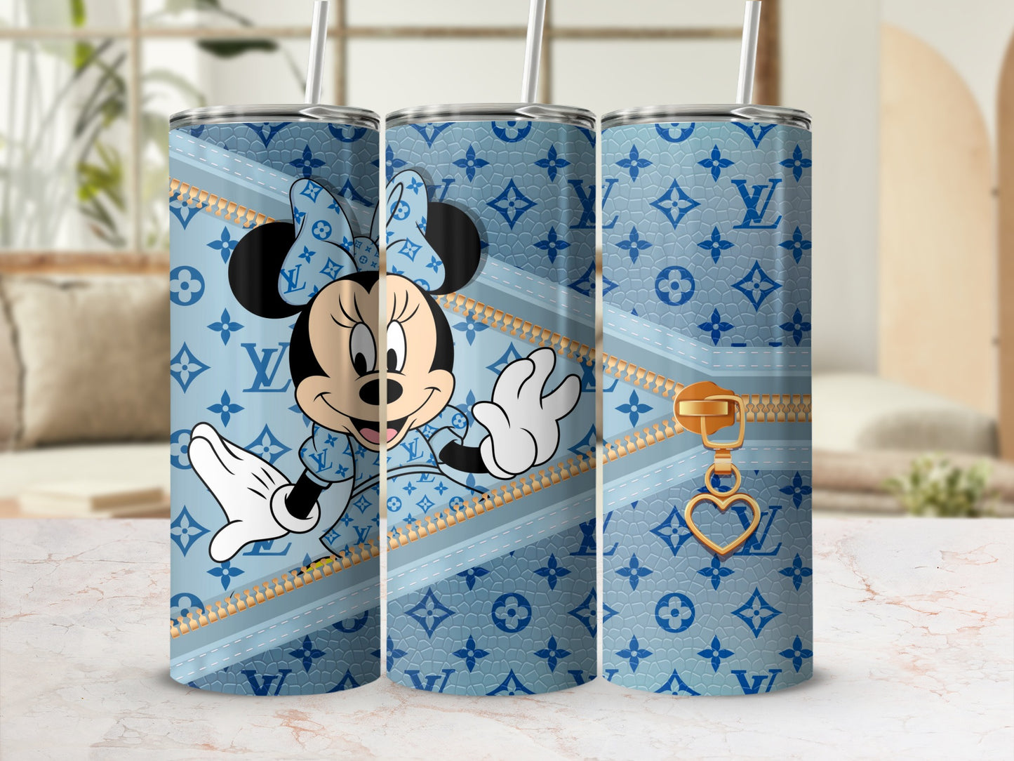 Minnie Mouse with Louis Vuitton pattern and gold zipper detail on a blue tumbler.