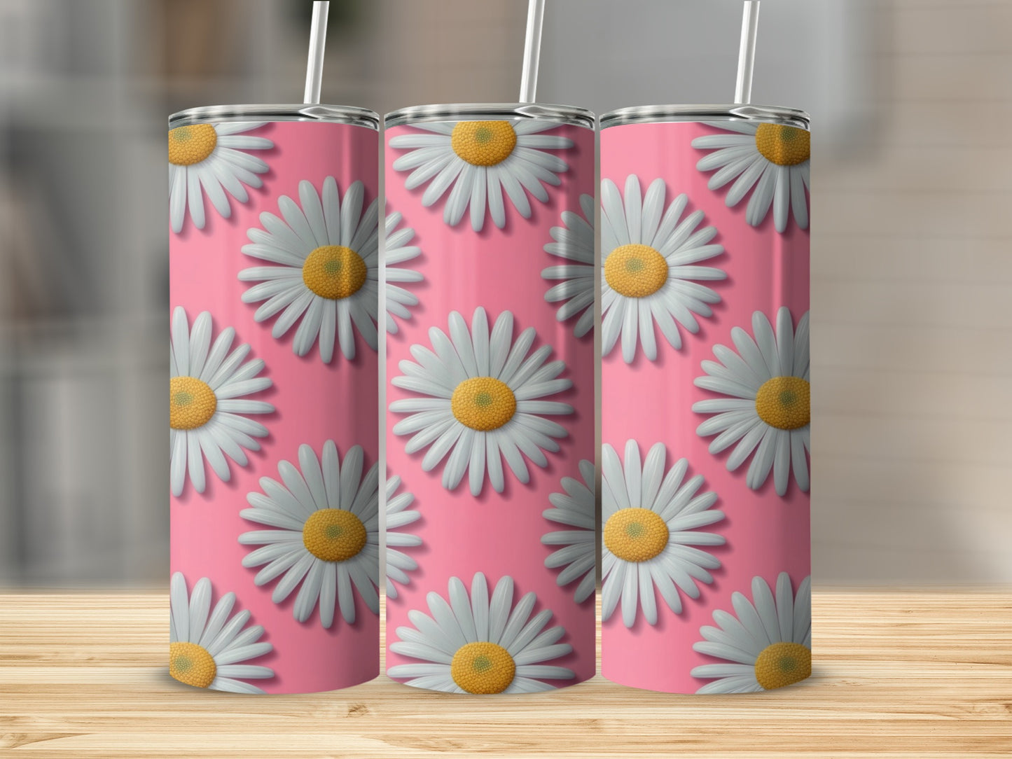 Three tumblers with a repeating daisy pattern on a pink background.