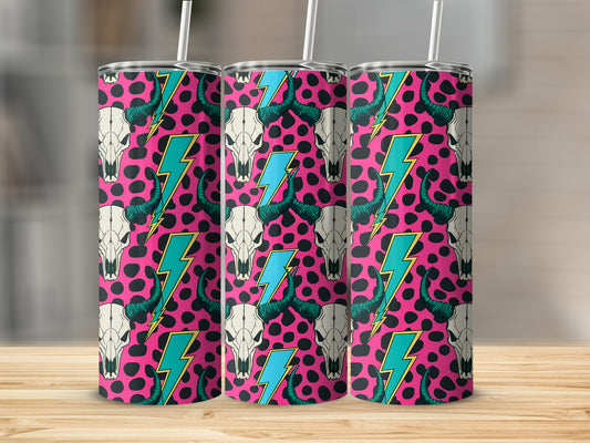 Three tumblers with cow skulls and teal lightning bolts on pink background.