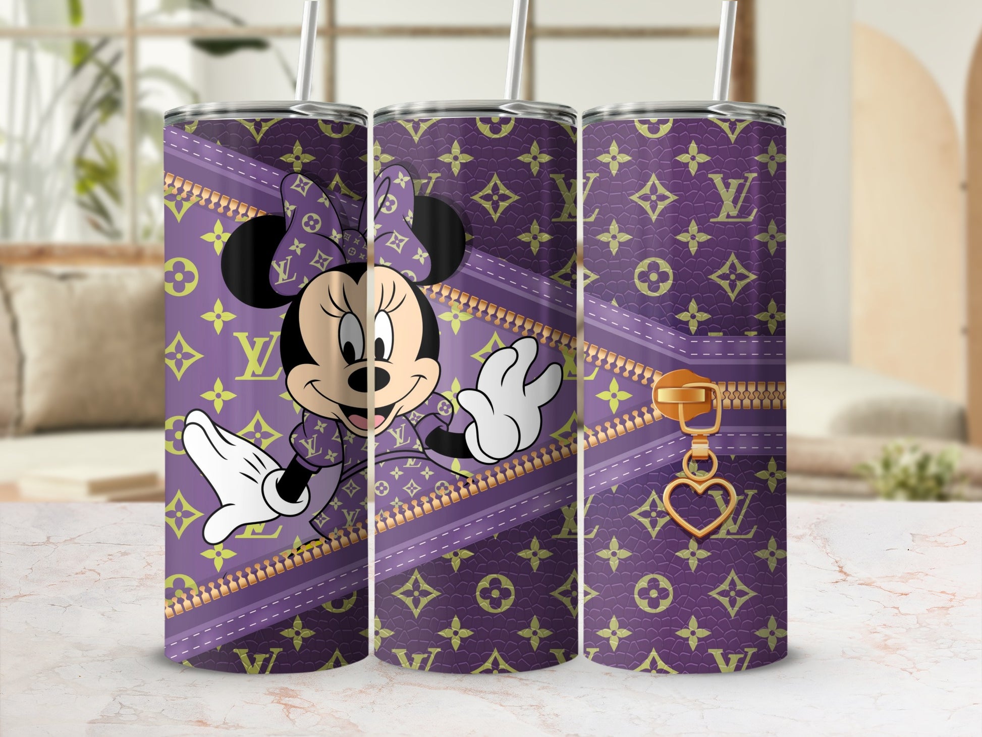 Purple tumbler with Minnie Mouse and Louis Vuitton pattern.