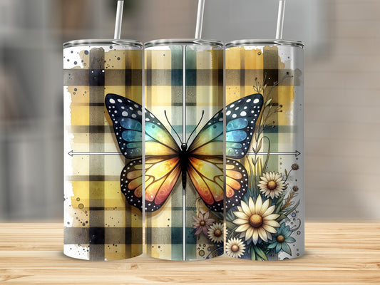Three tumblers with a butterfly and floral design on a wooden surface.
