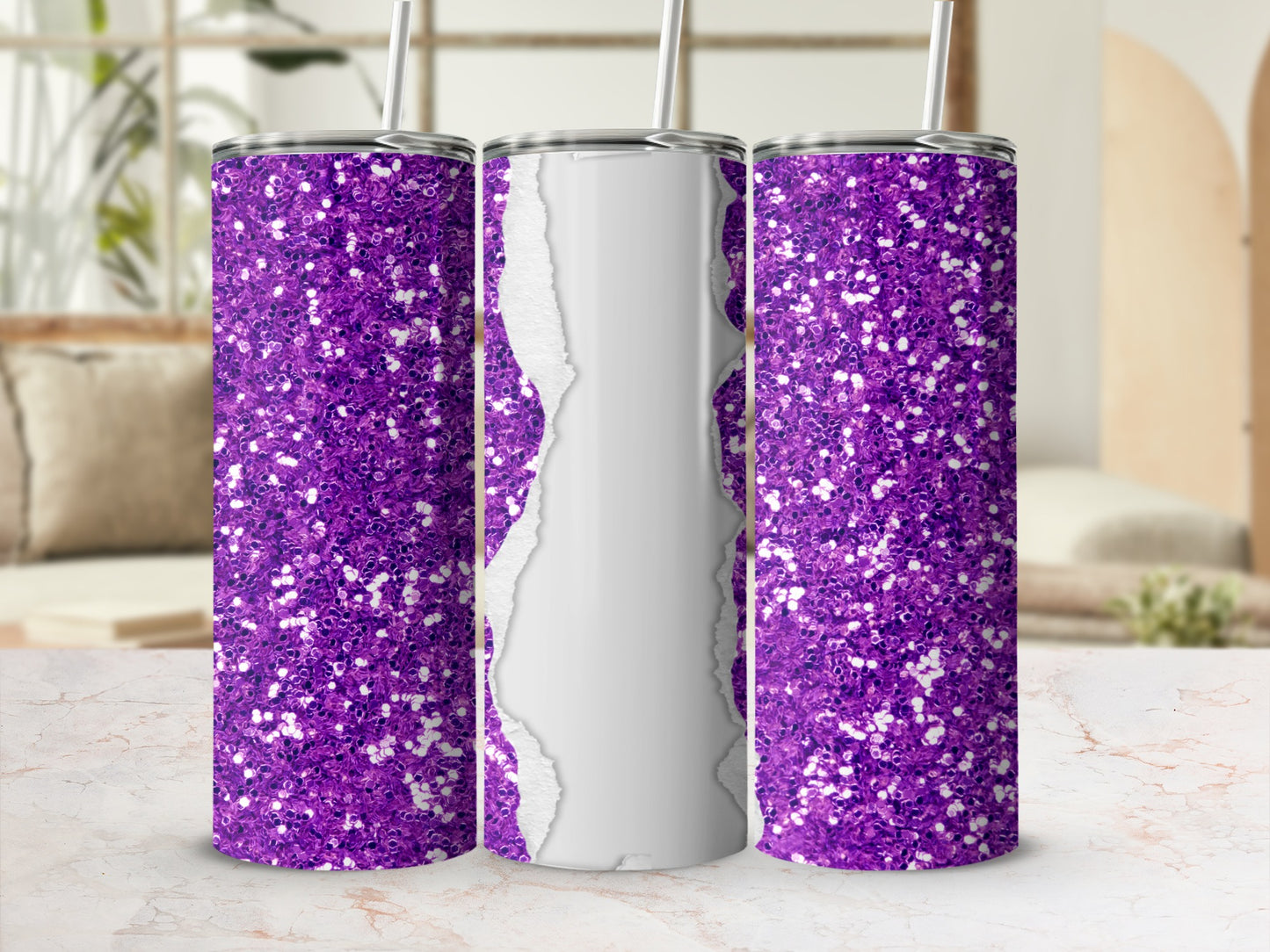 Purple glitter tumbler with a torn paper effect on a marble countertop.