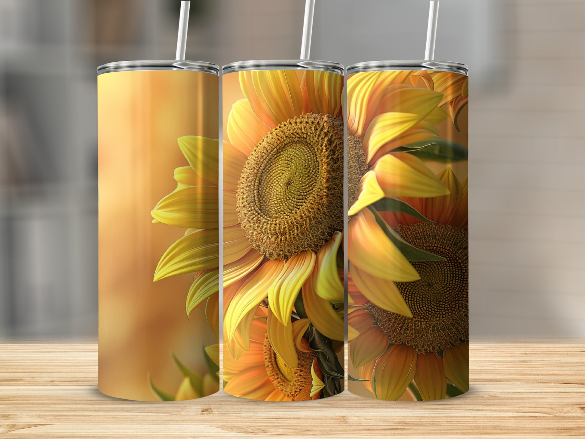 Three tumblers featuring detailed sunflower artwork on a wooden surface.