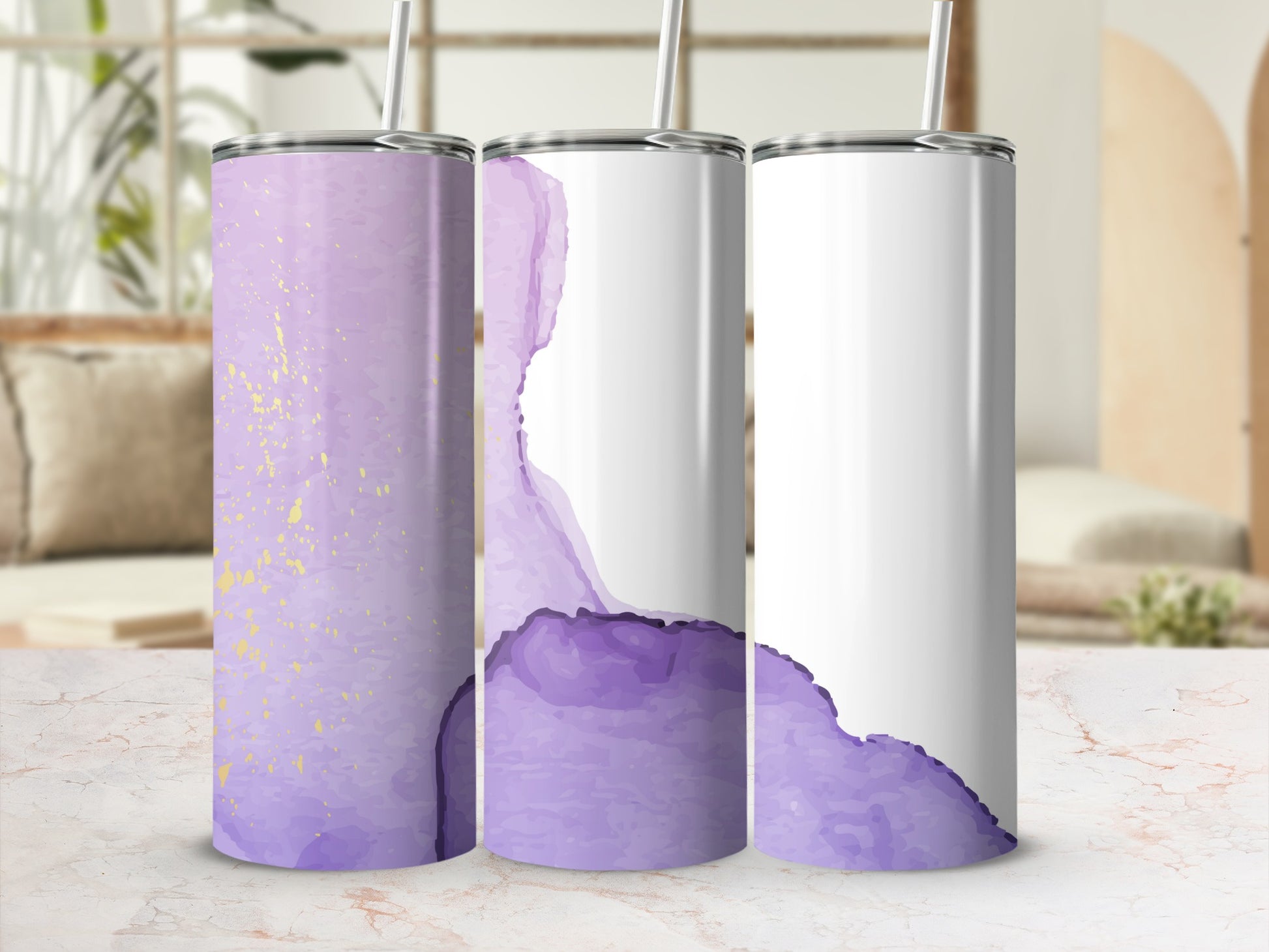Three tall tumblers with purple watercolor and gold splatter designs.