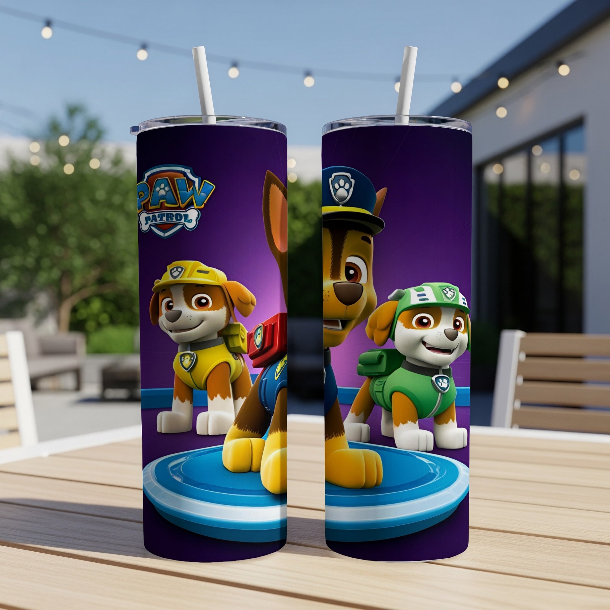 Paw Patrol characters Chase and Marshall on a purple background, on a table.