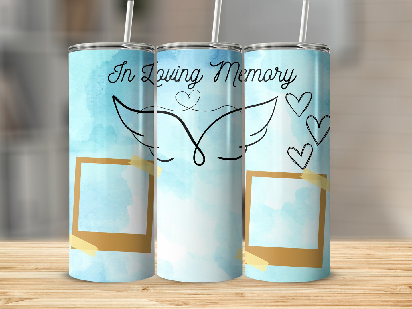 Three tumblers with "In Loving Memory" text, angel wings, hearts, and photo frames.
