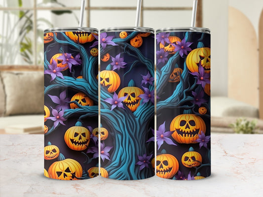 Tumbler with a Halloween tree design featuring jack-o'-lanterns and purple flowers.
