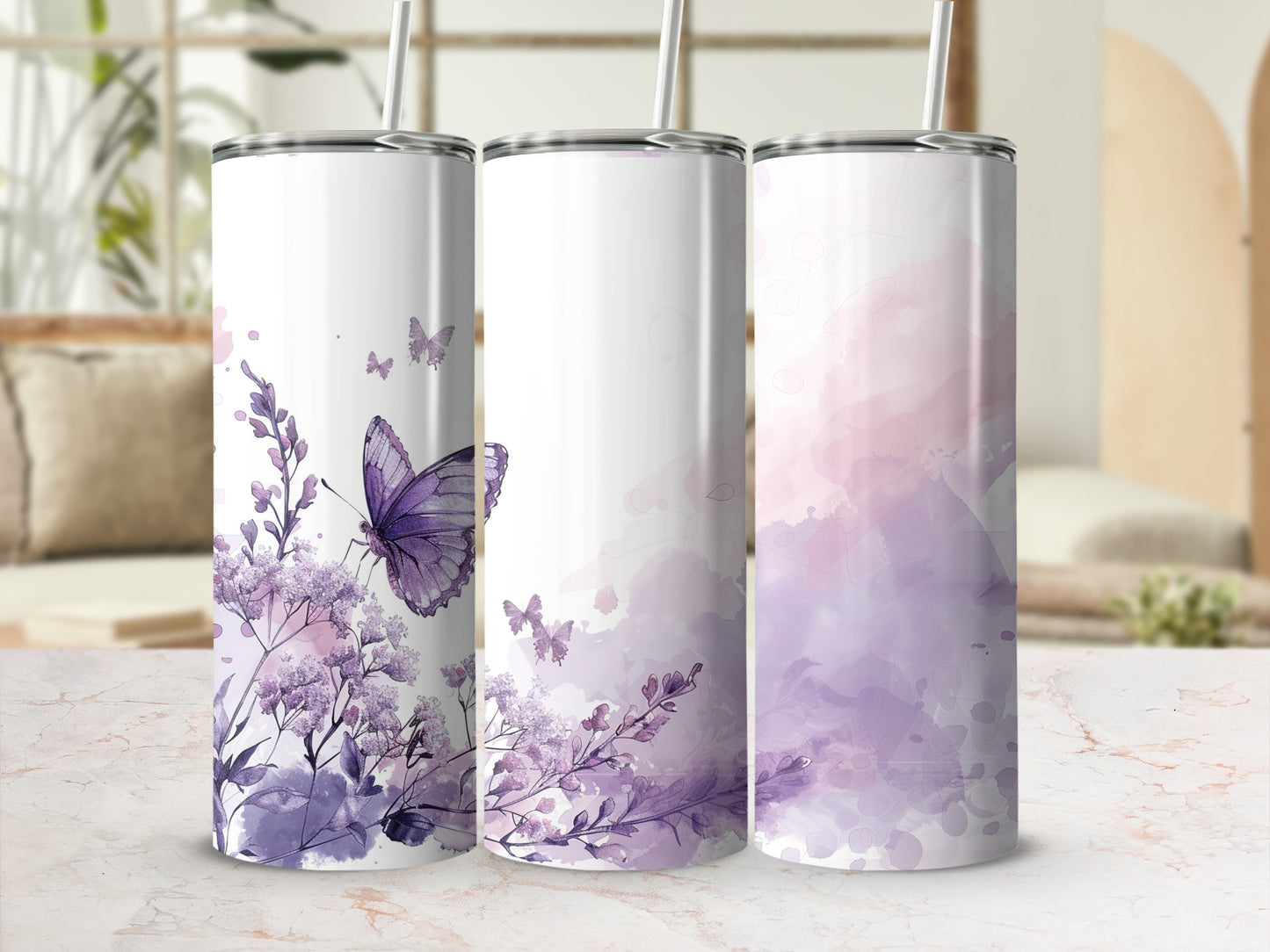 Purple butterflies and watercolor flowers on three tall, skinny tumblers.