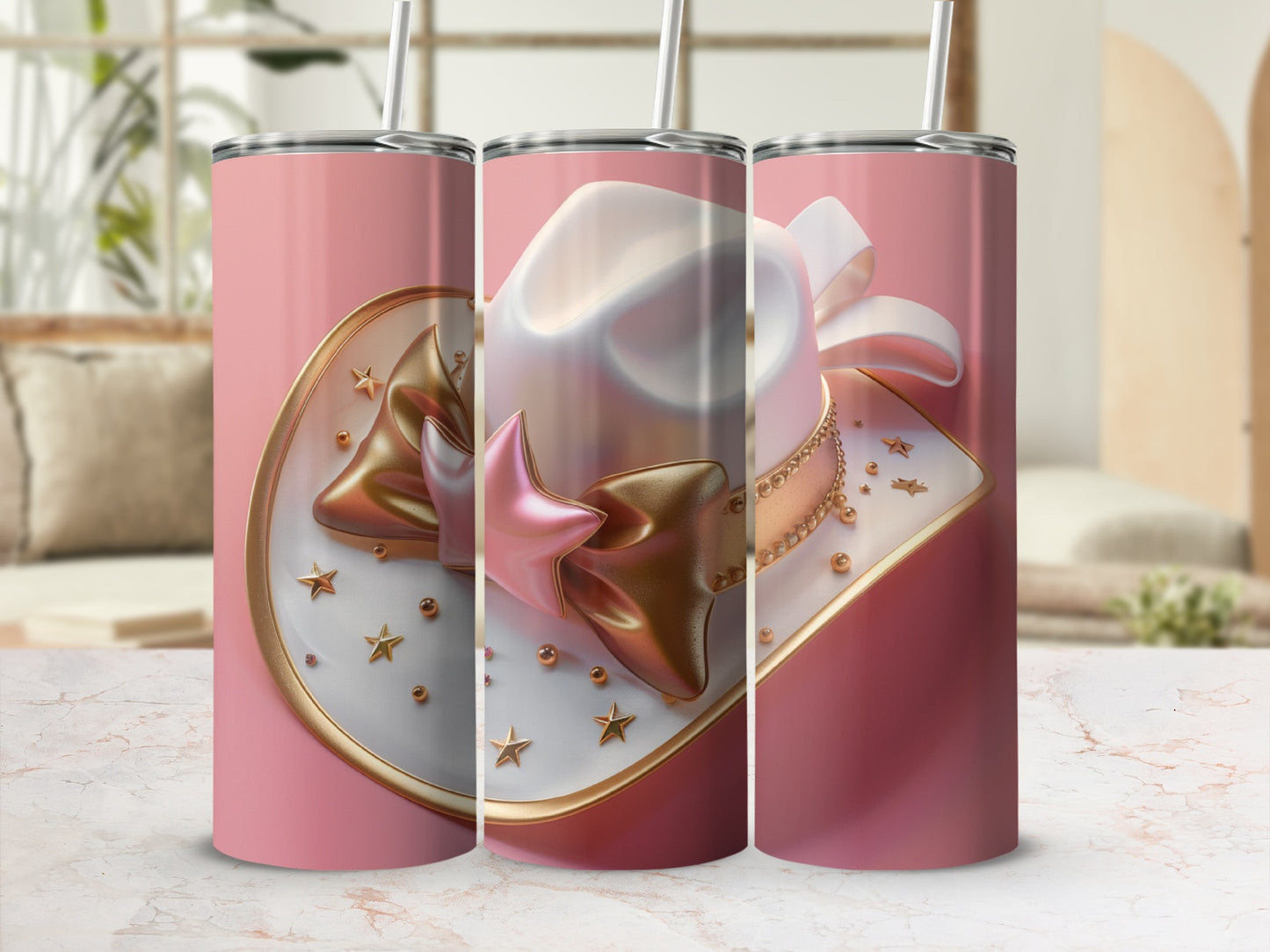 Three pink tumblers with cowboy hat and star designs.