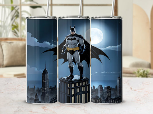 Batman stands heroically atop a skyscraper against a full moonlit city skyline.