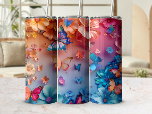Three tumblers with butterfly and floral designs.