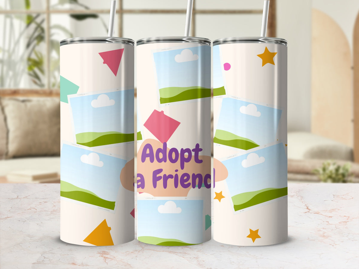 Tumbler with scattered photo frames, clouds, and stars, reads "Adopt a Friend".