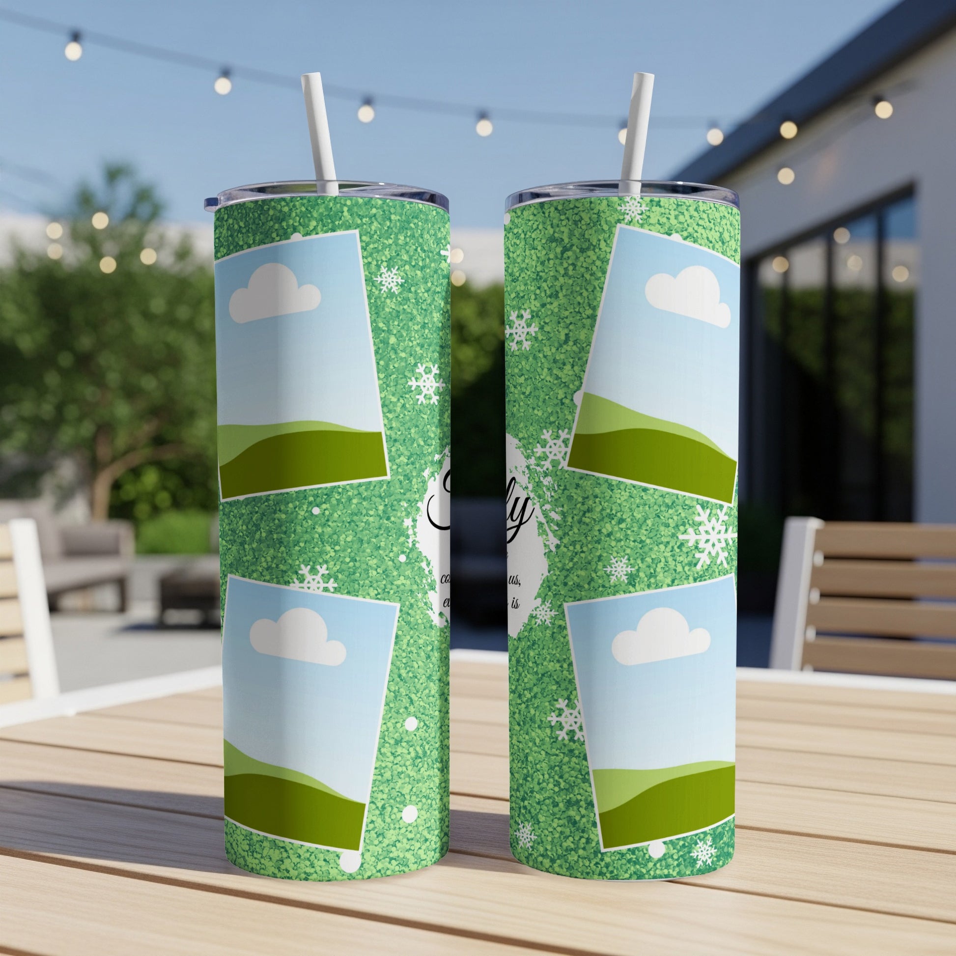Two green glitter tumblers with a photo collage of clouds and hills.