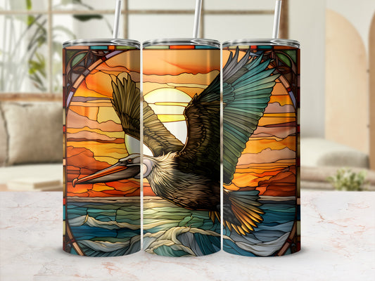 Triptych of a pelican flying over wavy water with stained glass sunset background.