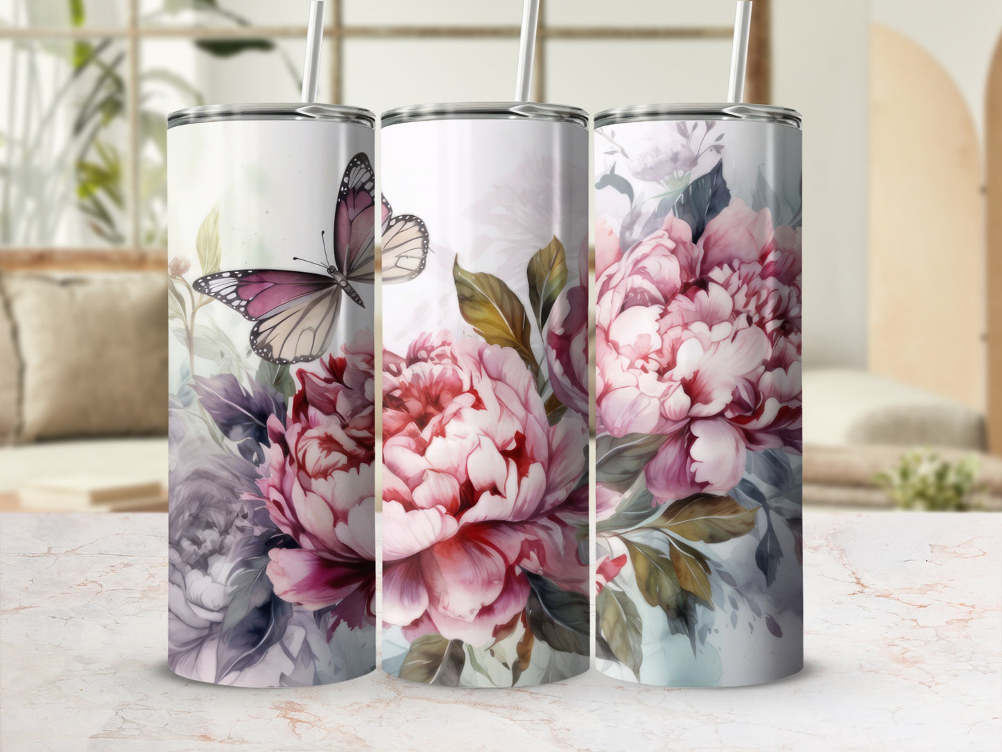 Three tumblers with pink peonies and a butterfly design.