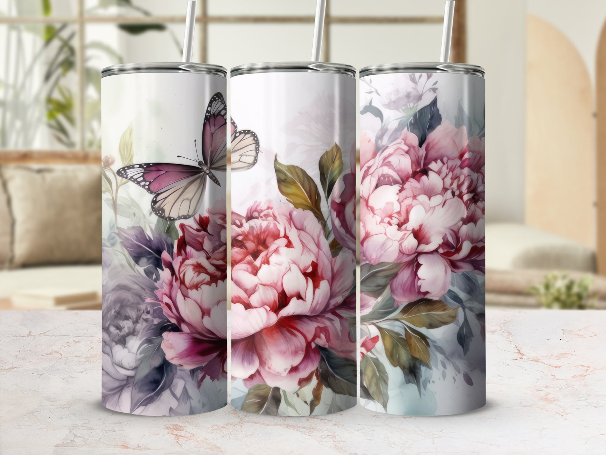Three tumblers with pink peonies and a butterfly design.