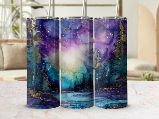 Three tumblers with a cosmic, starry forest scene and metallic accents.