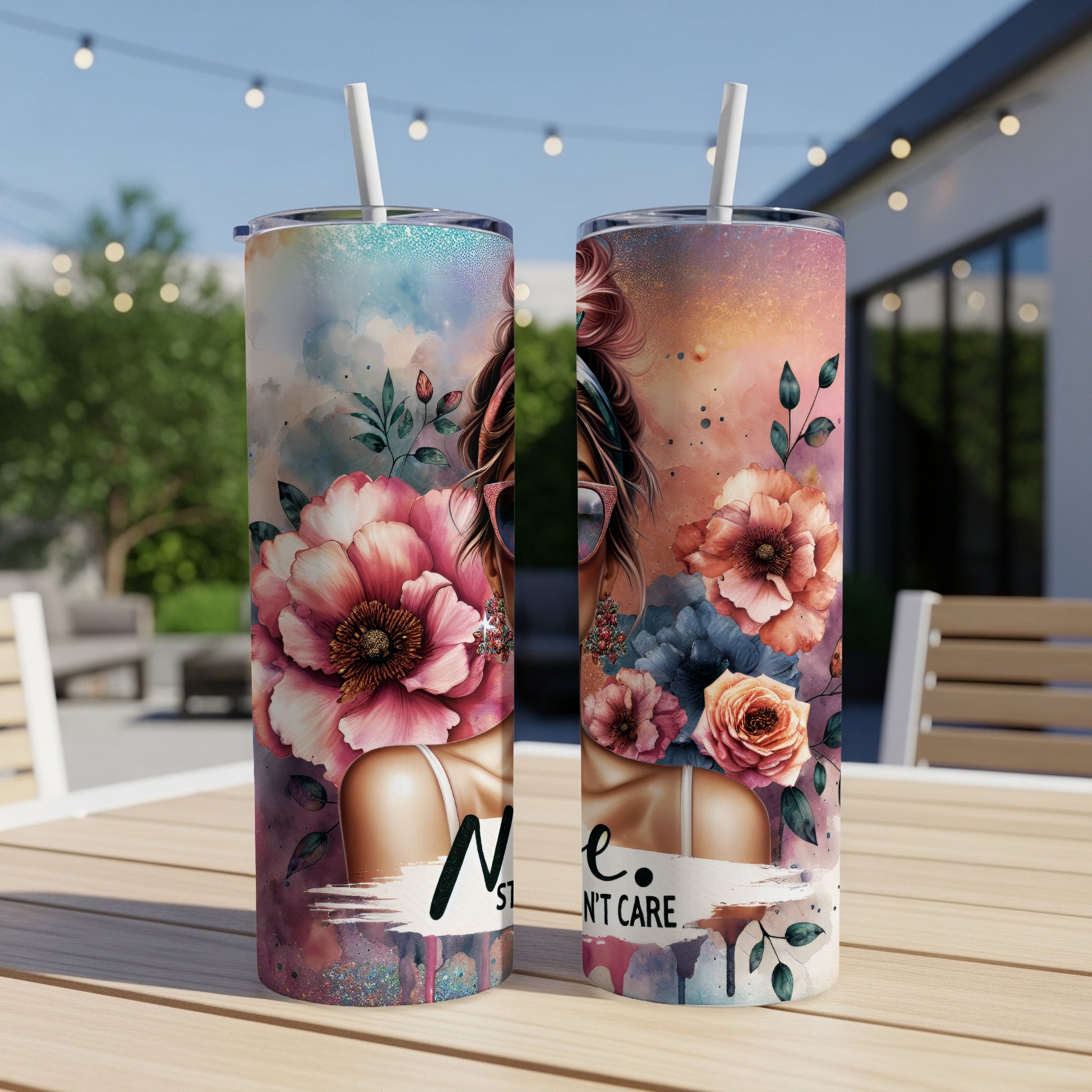 Two tumblers with watercolor floral designs and the text "Not gonna lie I don't care."