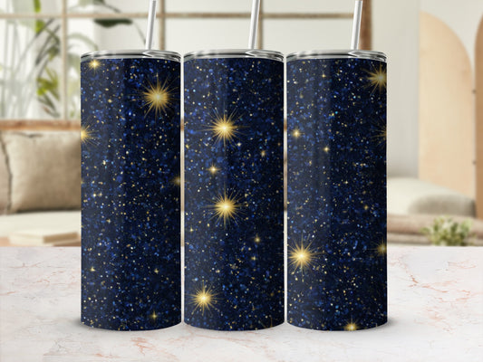 Three dark blue tumblers with gold glitter and starbursts.