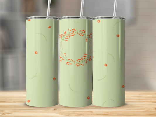 Three tall, slender tumblers with a light green background and red floral pattern.