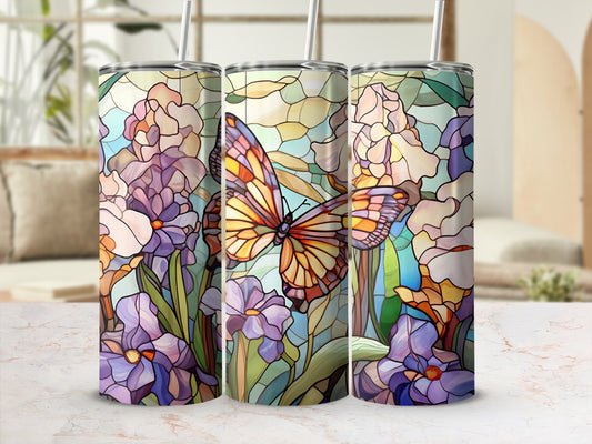 Butterfly and floral stained glass pattern on three tumblers.