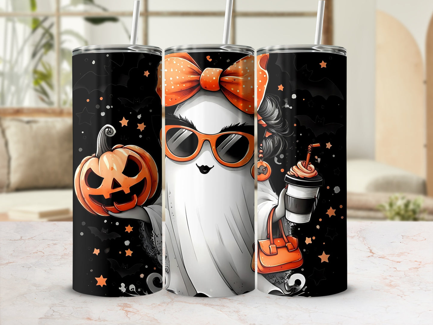 Three Halloween-themed tumblers featuring ghosts, pumpkins, bats, and stars.