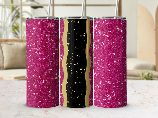 Three glitter tumblers with gold accents on a marble surface.