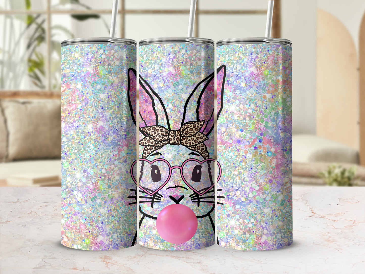 Glittery bunny tumbler with pink heart glasses and bubblegum.