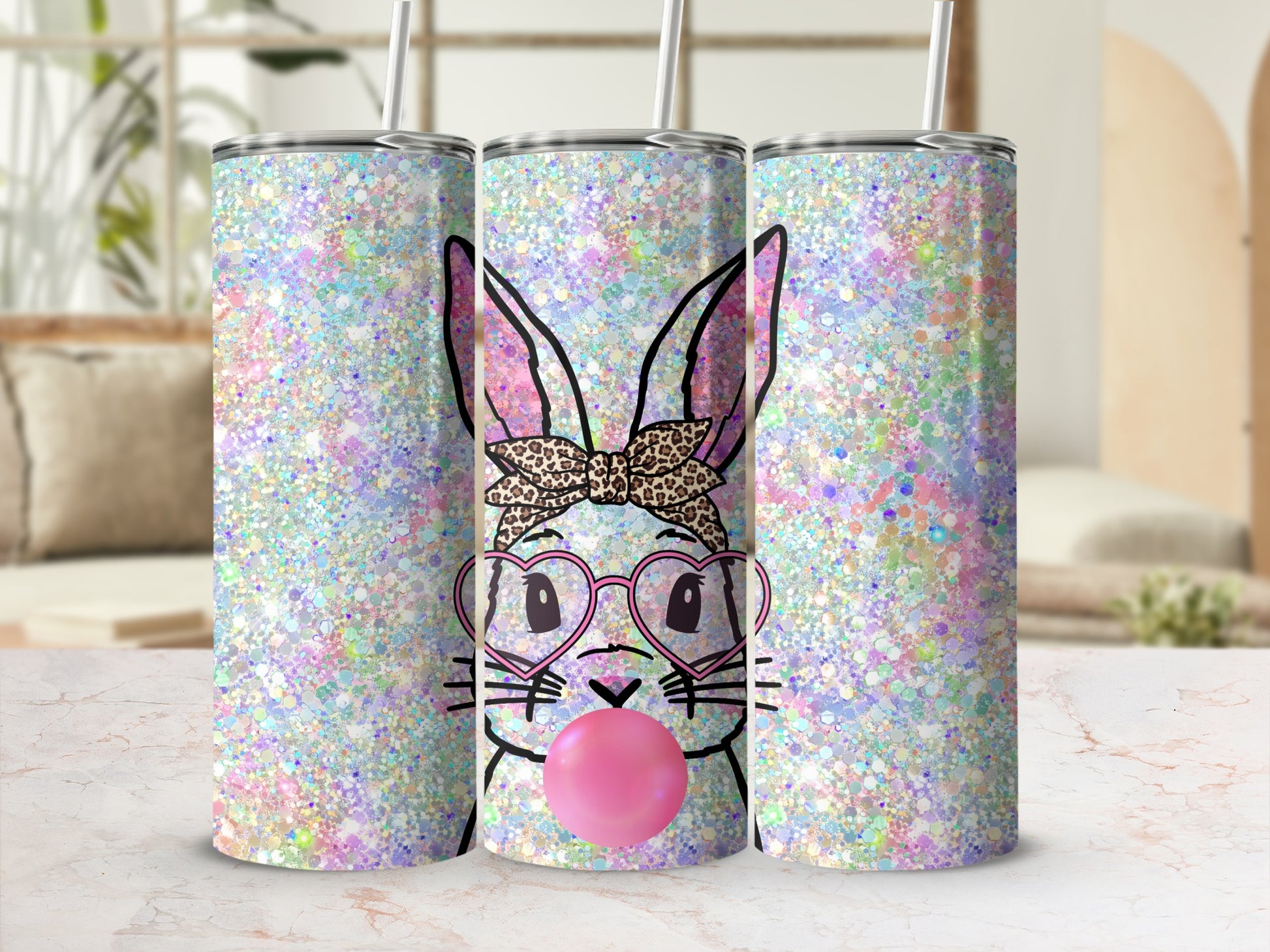 Glittery bunny tumbler with pink heart glasses and bubblegum.