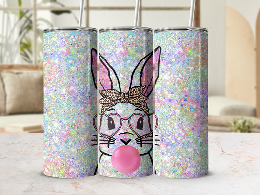 Glittery bunny tumbler with pink heart glasses and bubblegum.
