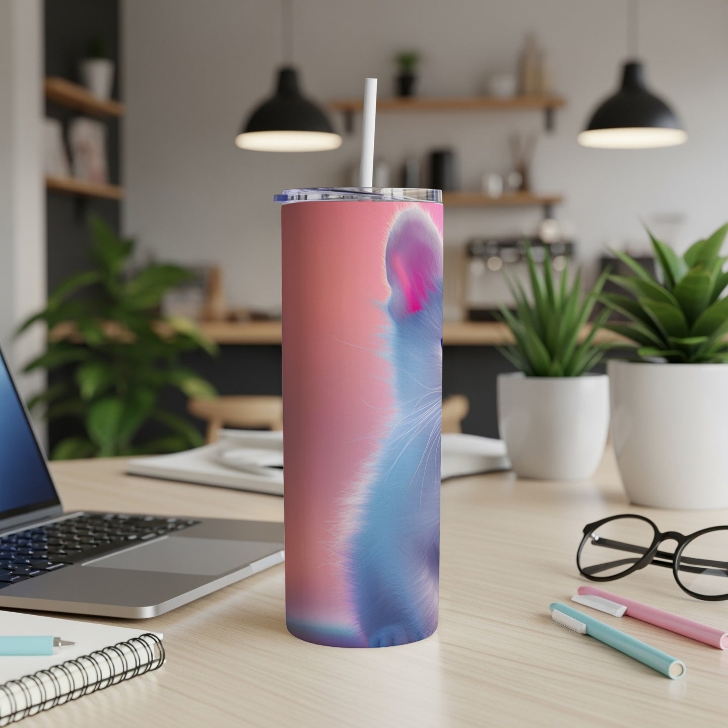 Tall tumbler with a blue and pink cat face illustration.