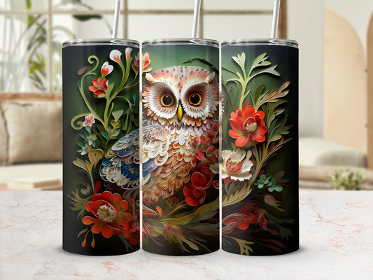Three tumblers with a detailed owl and floral design on a marbled surface.
