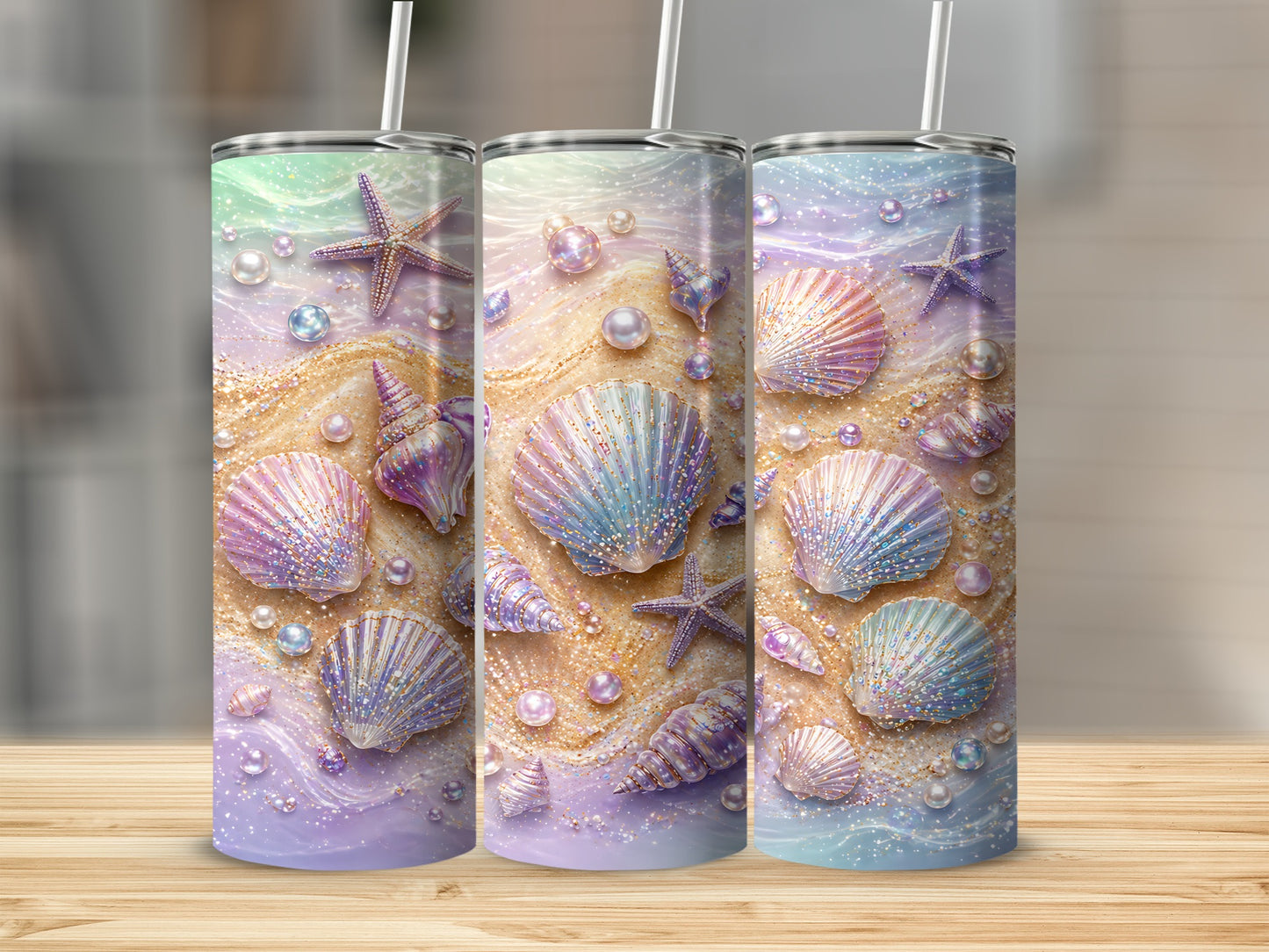 Three tumblers featuring a pastel beach scene with seashells and starfish.