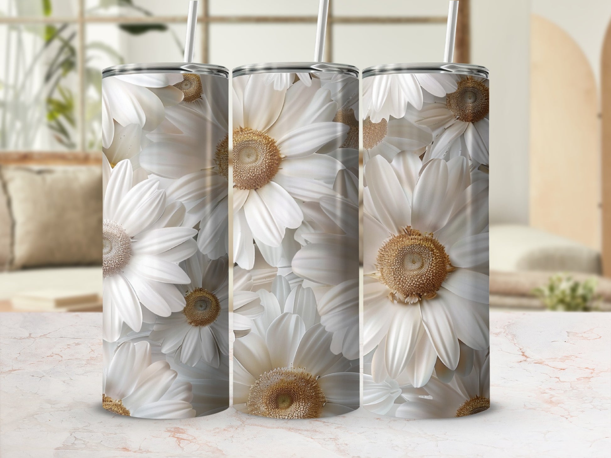 Three tumblers with a white daisy floral pattern.