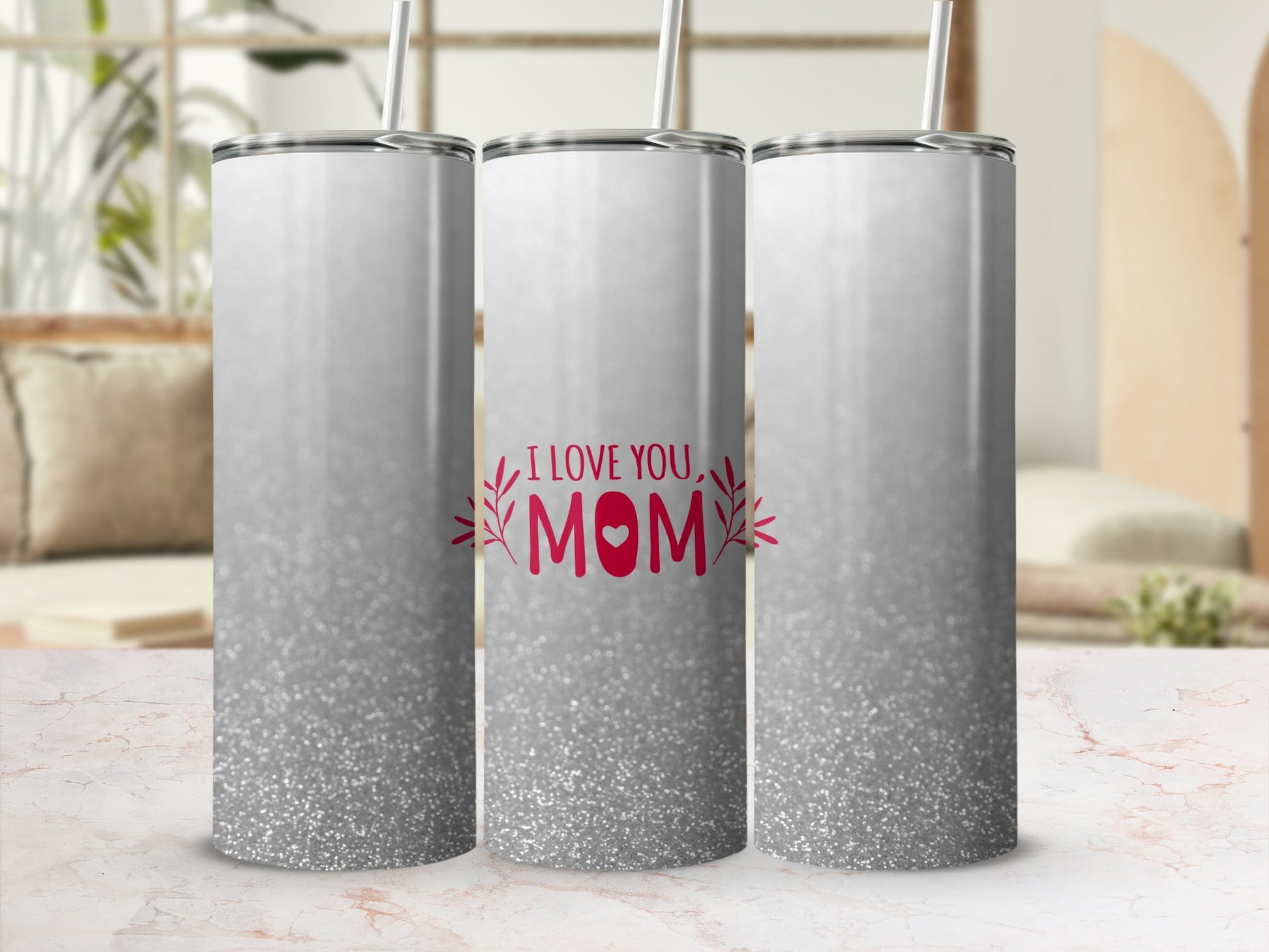 Silver glitter tumbler with "I LOVE YOU, MOM" text and heart design.